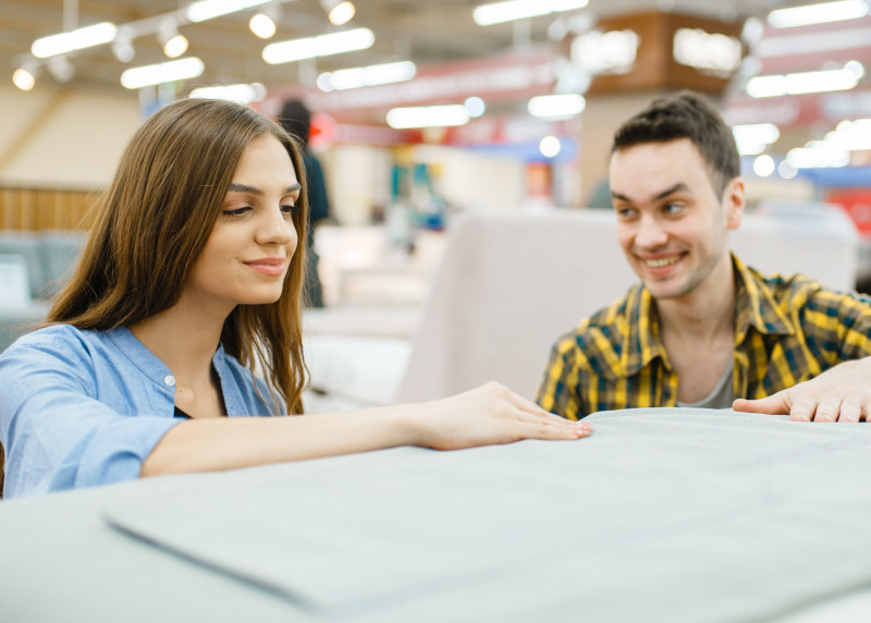 woman and man select home goods at store